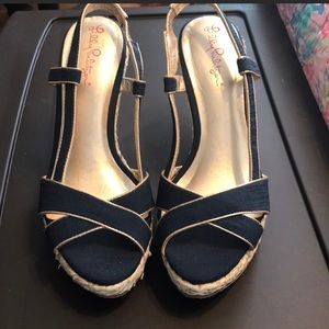 Navy and gold Lilly Pulitzer wedge sandals.